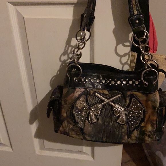 Purses, sweaters, jeans, shirts, shoes, and much more… - Picture 1 of 17